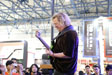 The bass guitar master Stu Hamm in the exhibition scene show flute